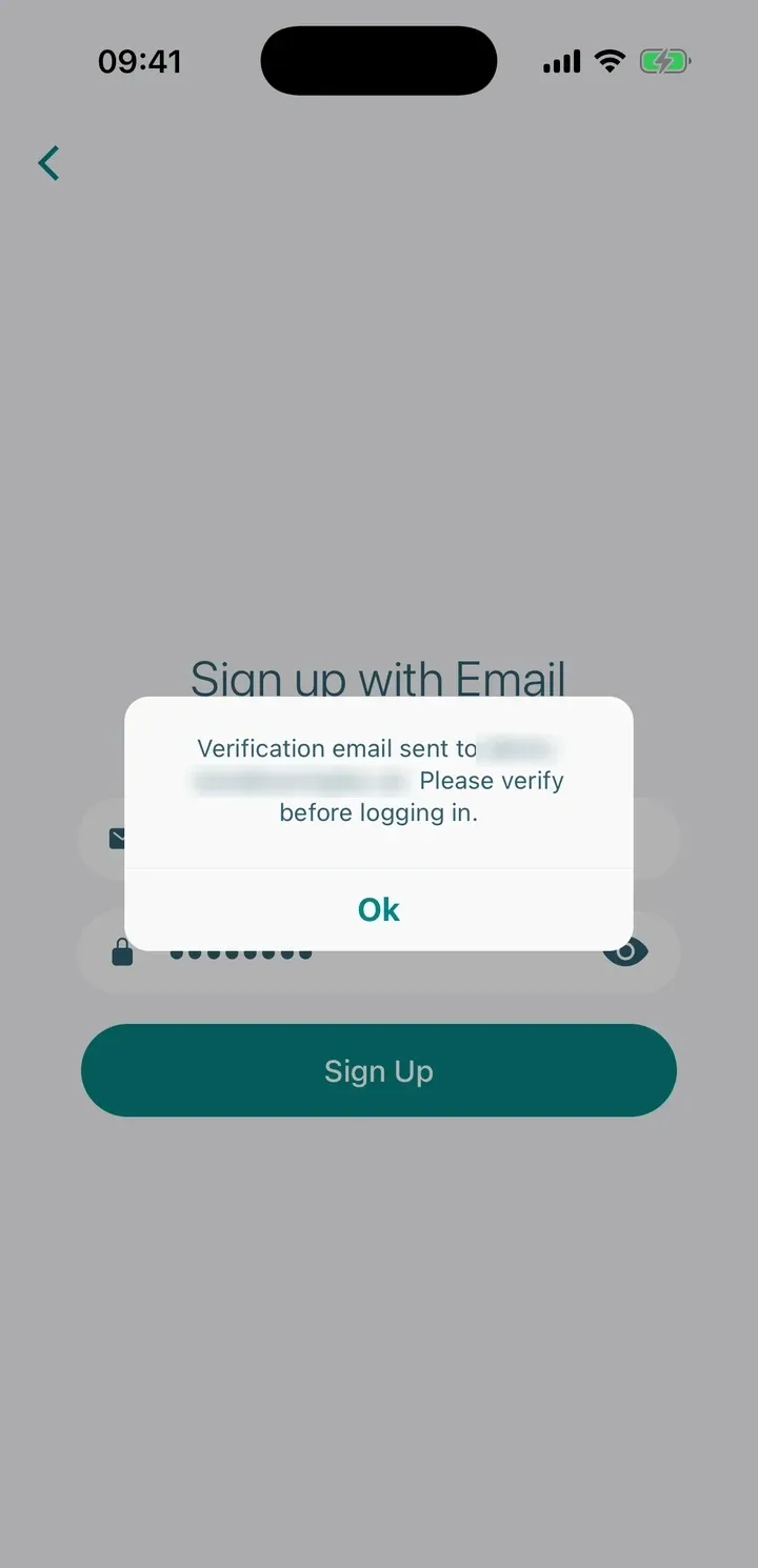 Message saying a verification email was sent and to verify before logging in, with an OK button